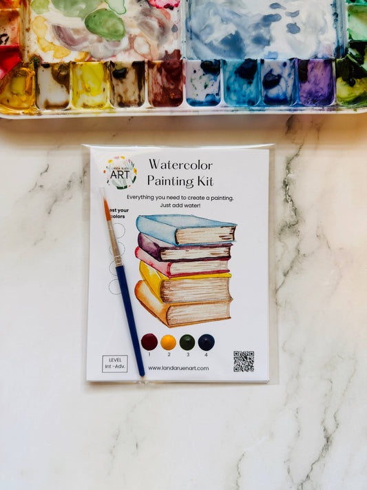 Watercolor painting kit on a marble surface