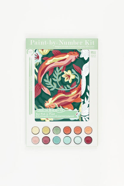 Paint-by-Number kit with koi fish design and paint pods on a white background