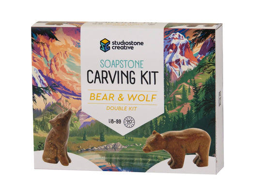 Soapstone carving kit packaging with bear and wolf figures. 