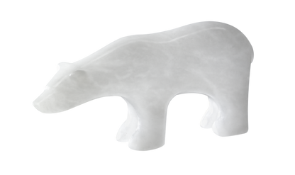 A white polar bear carved from alabaster.