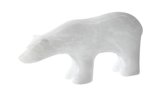A white polar bear carved from alabaster.