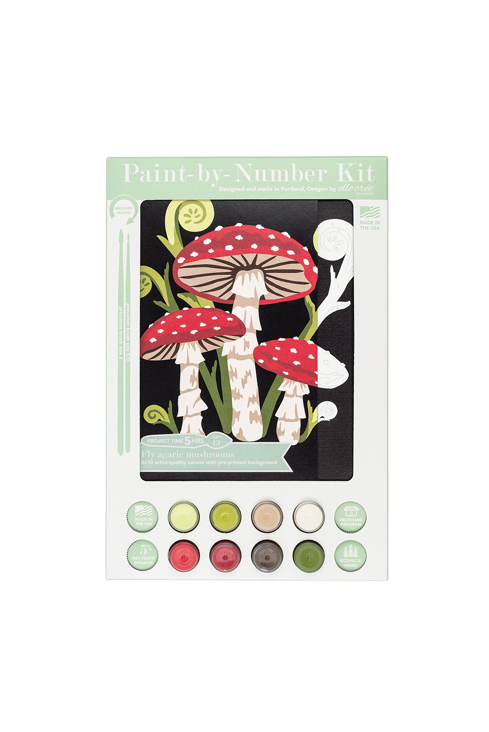 Paint by number kit with mushroom design and color swatches on a white background