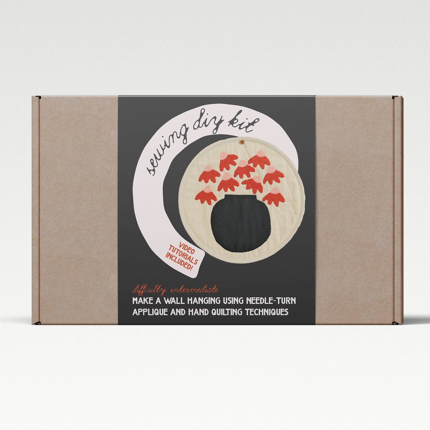 Sewing kit packaging with a label on a white background