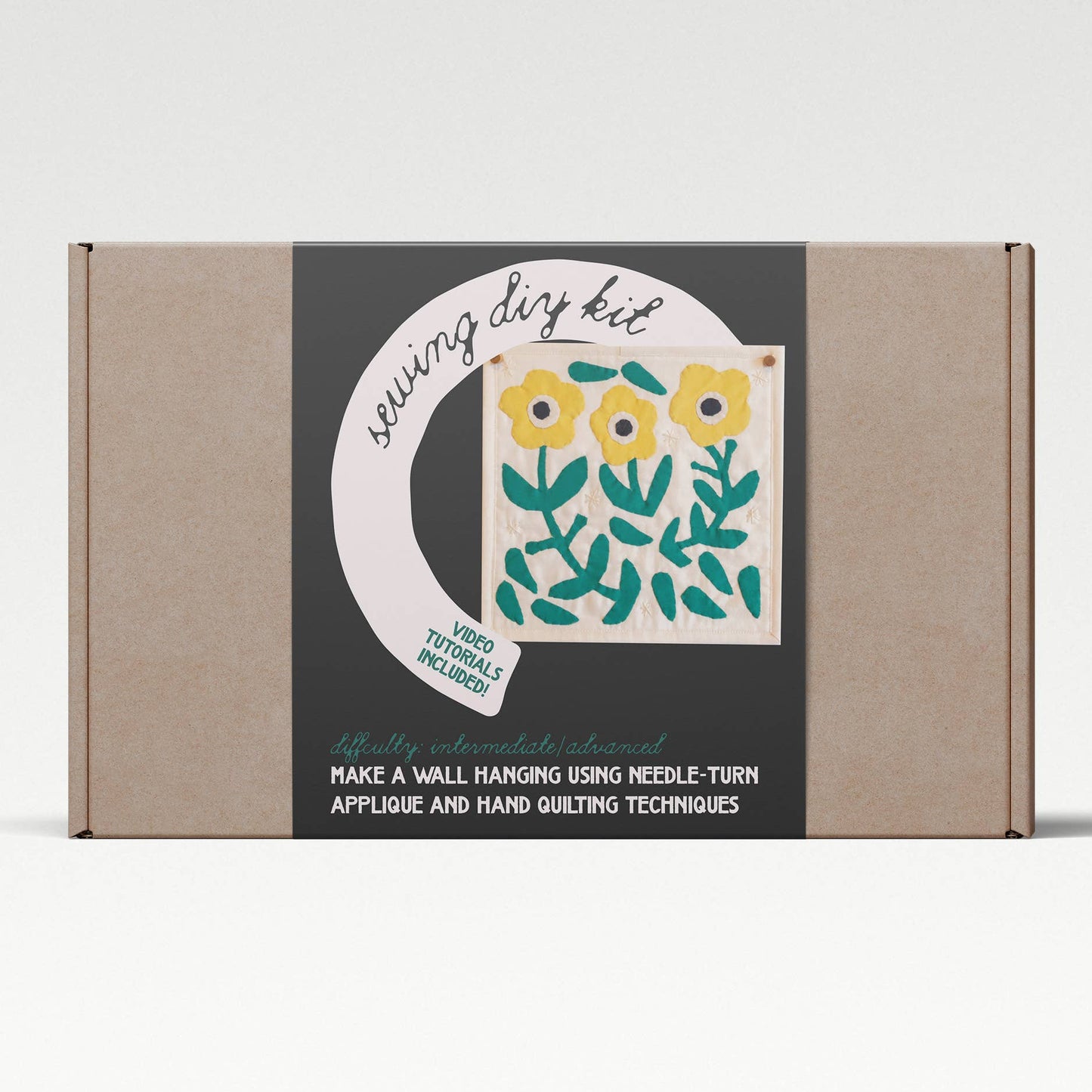 Cardboard box with a floral design and text on a white background