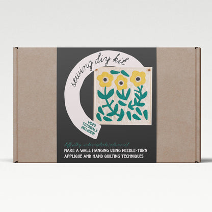 Cardboard box with a floral design and text on a white background
