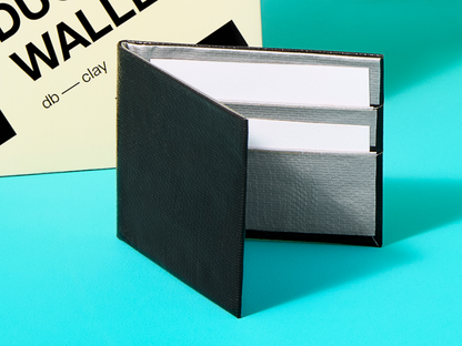 Black duct tape wallet on a blue background 