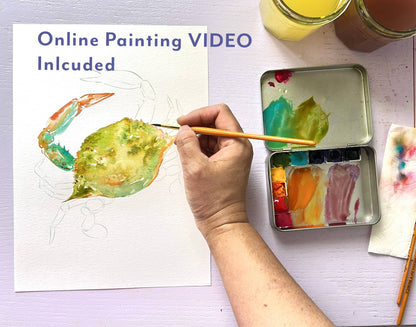 Hand painting a crab with watercolors on a white surface, with an online painting video included text.