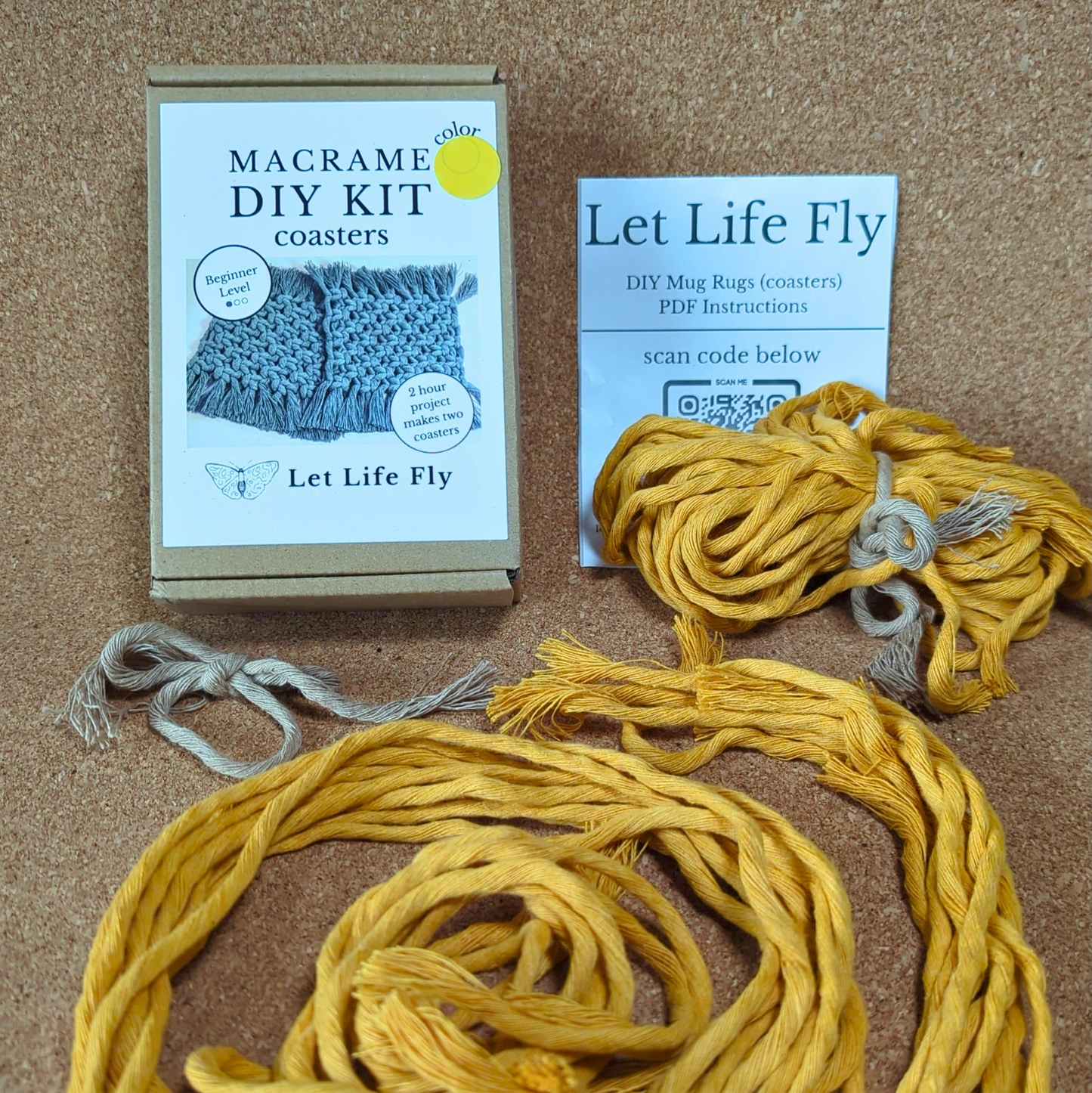Macrame DIY kit with cord and instructions on a cork surface
